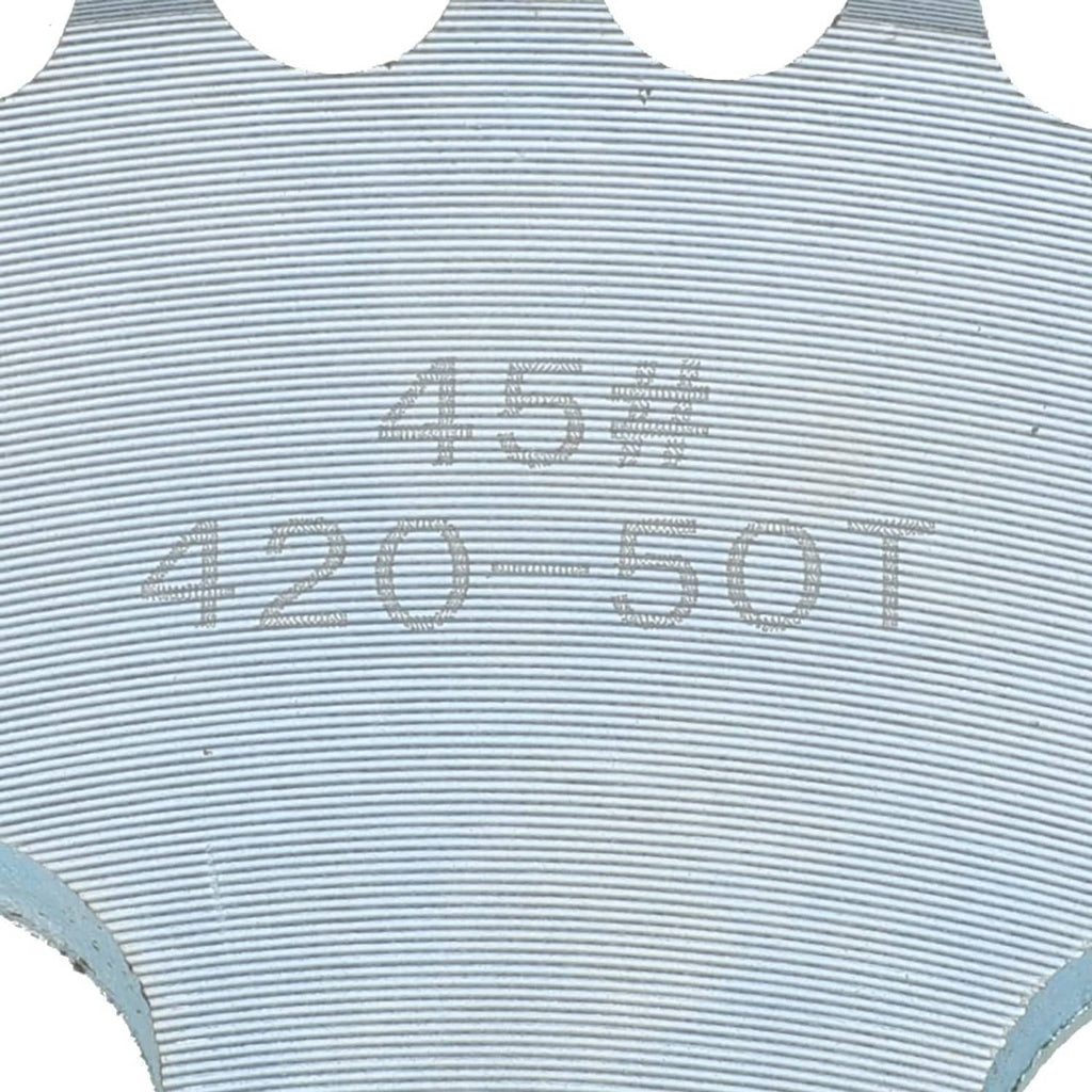Close-up of sprocket teeth and stamped marking "420-50T" on metal surface
