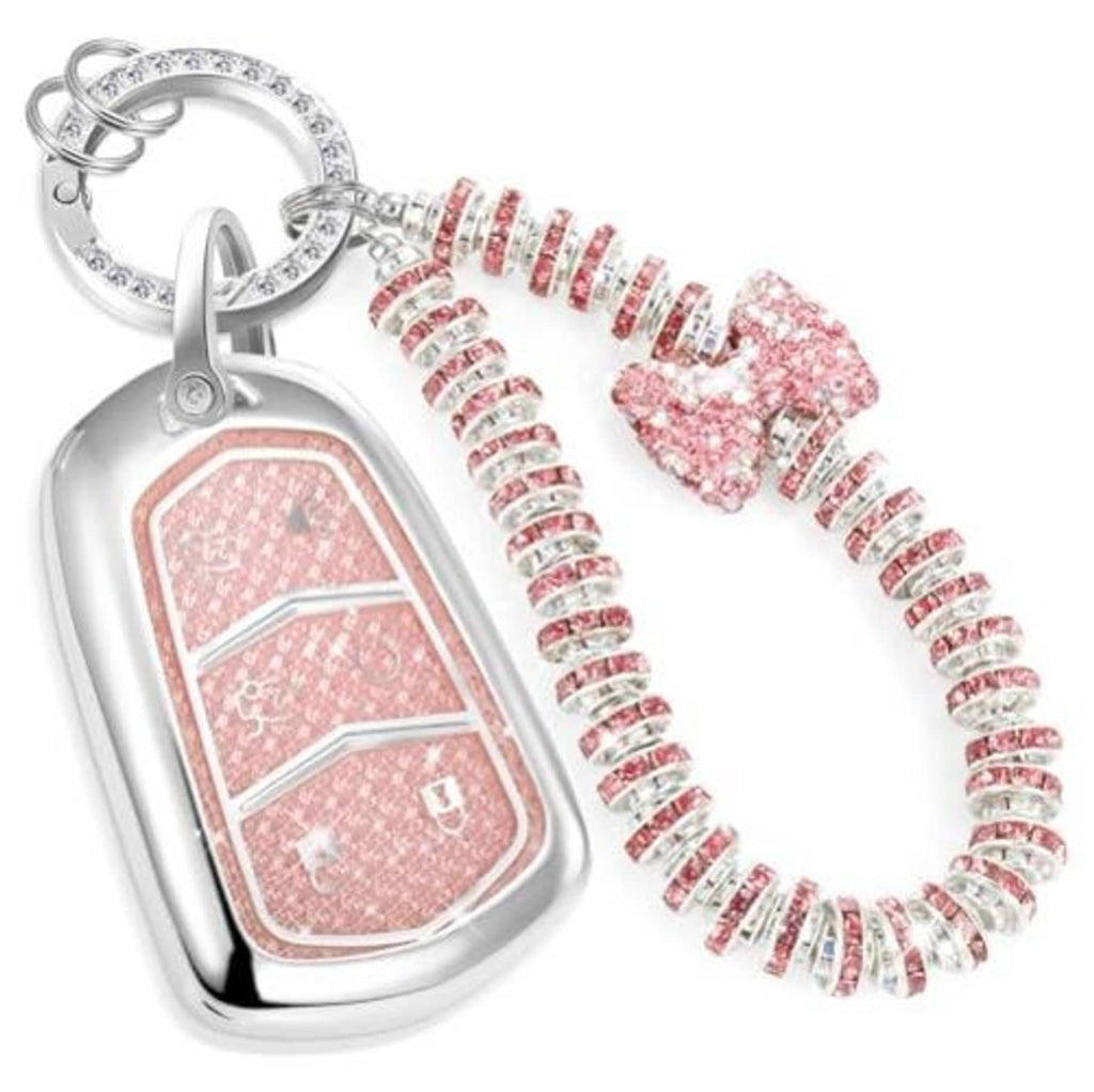 Pink glitter key fob cover with rhinestone wristlet and bow charm key ring