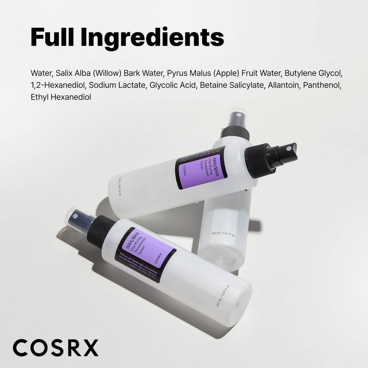 Two AHA/BHA clarifying toner bottles with black sprayers and purple label