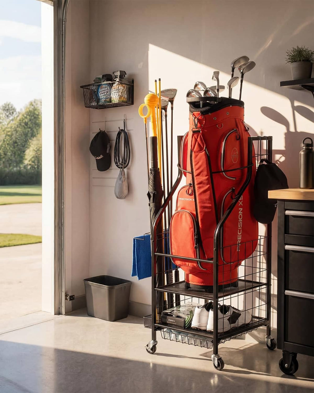 Freestanding golf bag storage rack with elastic bands and side shelf, black frame and red bag