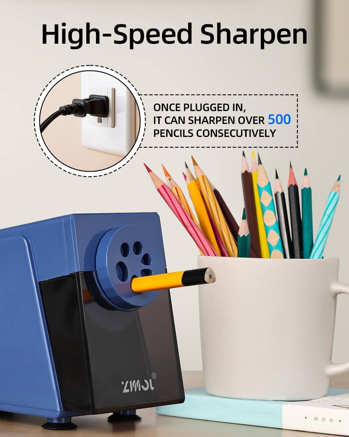 Blue electric pencil sharpener beside pencils with the sharpening dial visible