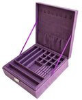 Two-layer purple jewelry box organizer, open with padded ring and earring slots