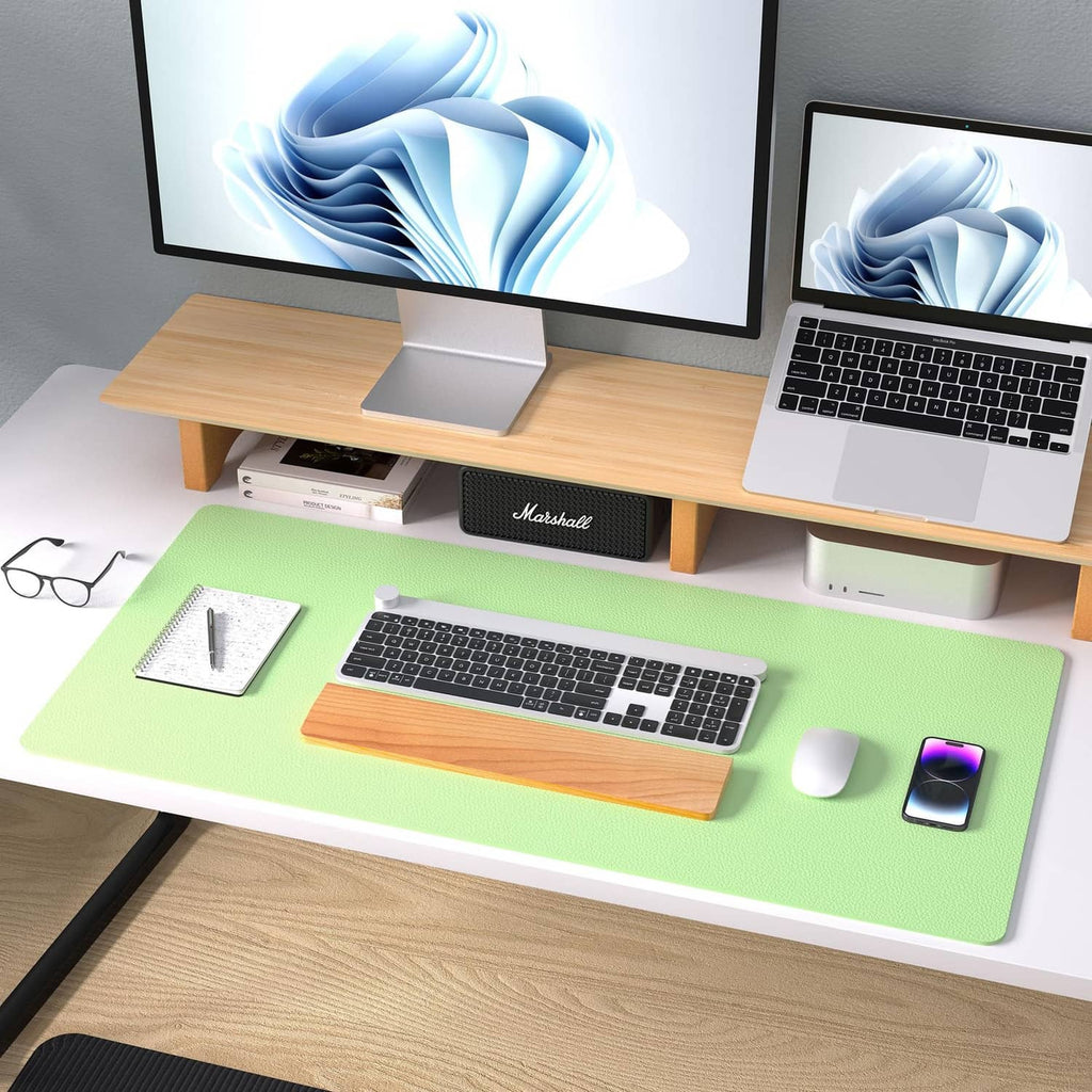 Foam green PU leather desk pad with laptop keyboard and mouse on desk