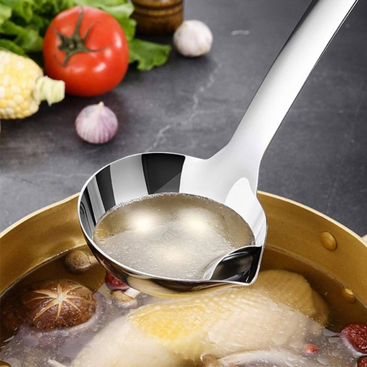 Stainless steel soup fat separator ladle filtering oil from broth