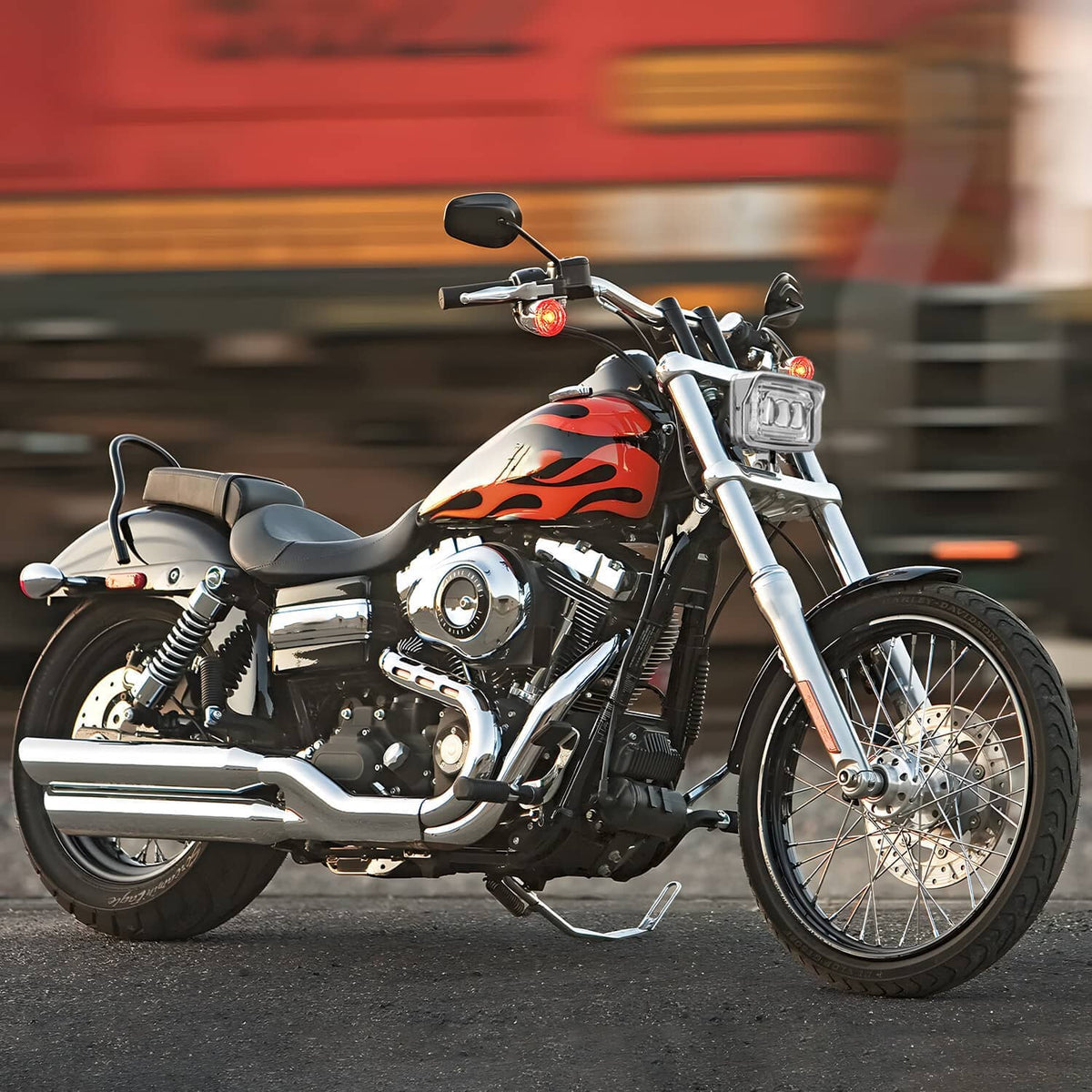 Motorcycle front featuring a squared chrome LED headlight with amber side lights