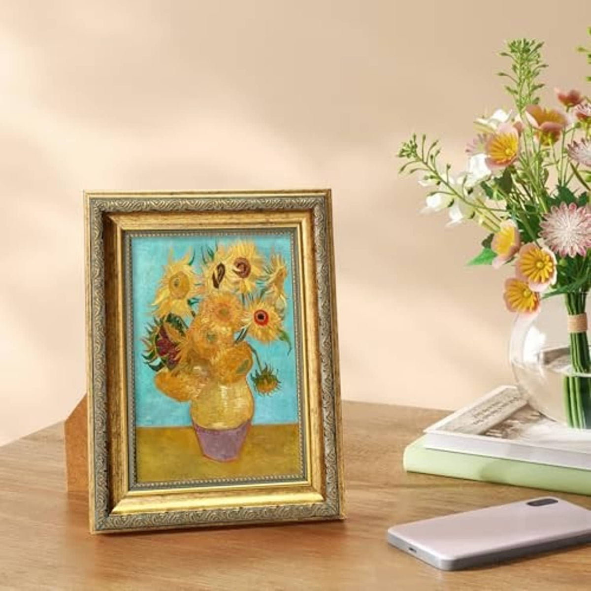 Ornate gold 5x7 picture frame with sunflower artwork behind clear glass