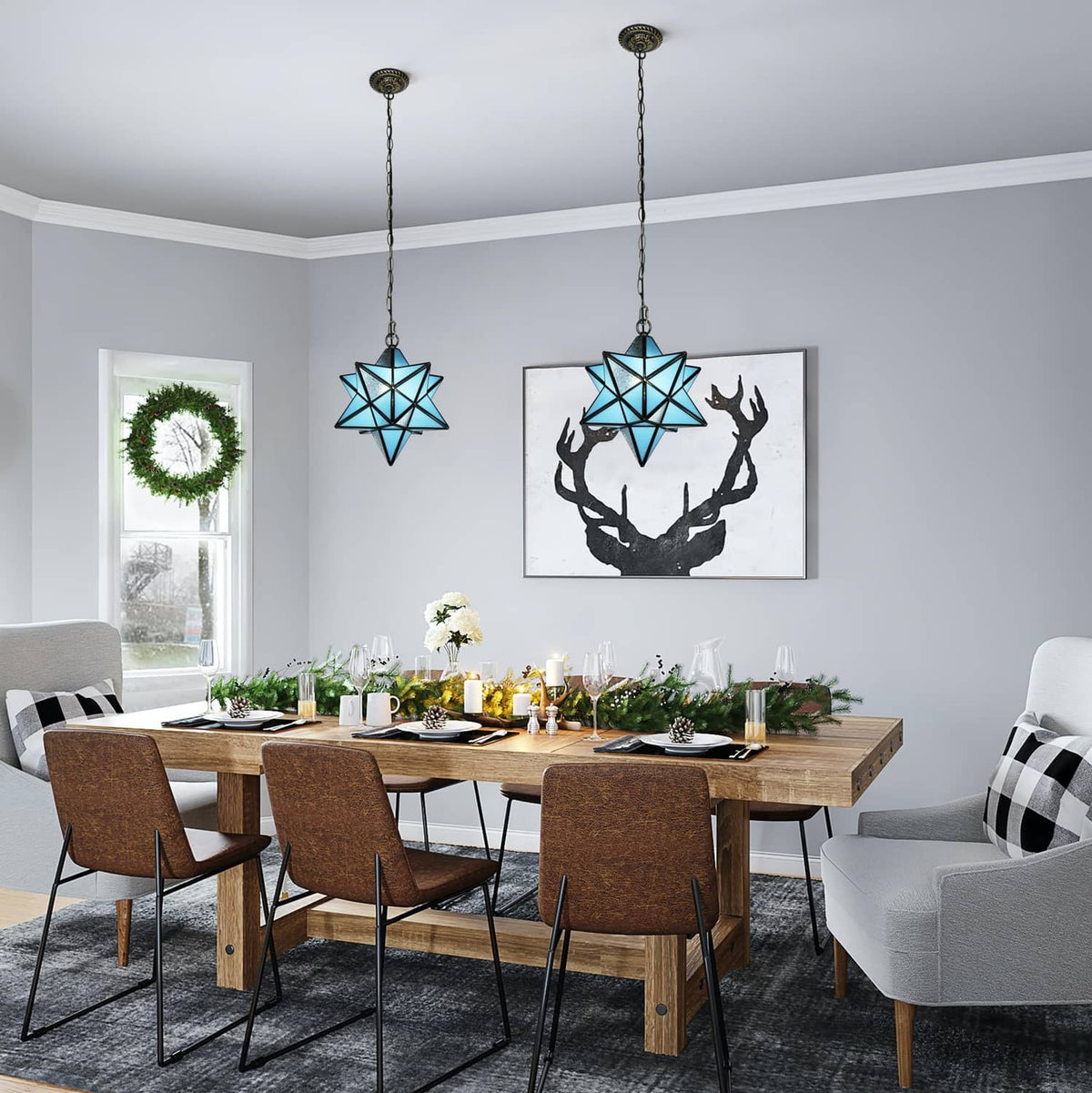 Blue stained glass star pendant light hanging from a metal chain