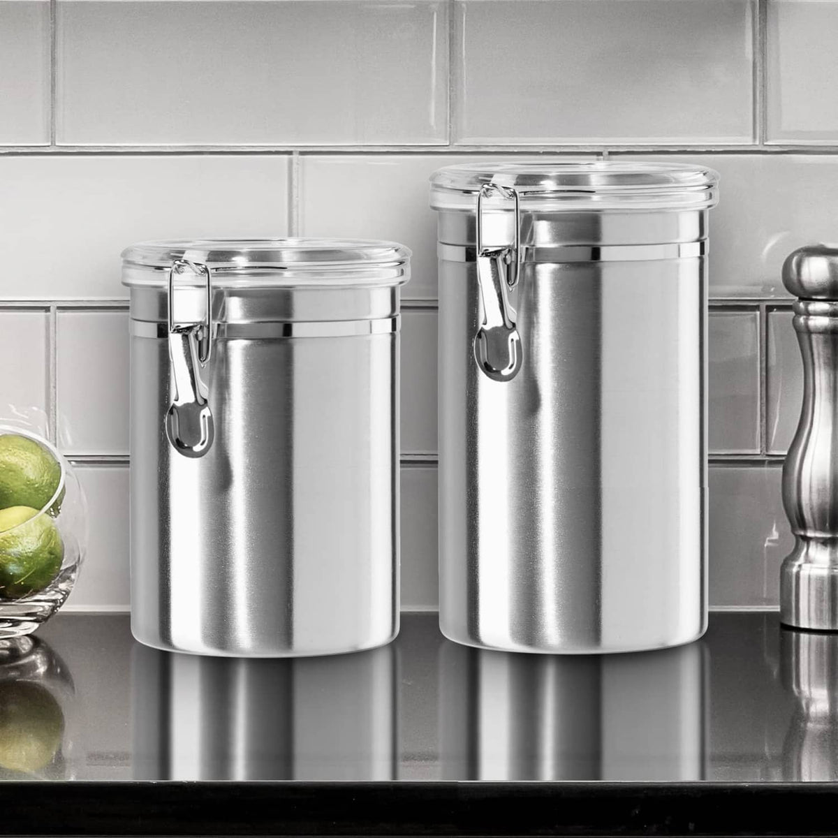 Set of stainless steel airtight food storage canisters with clear clamp lids