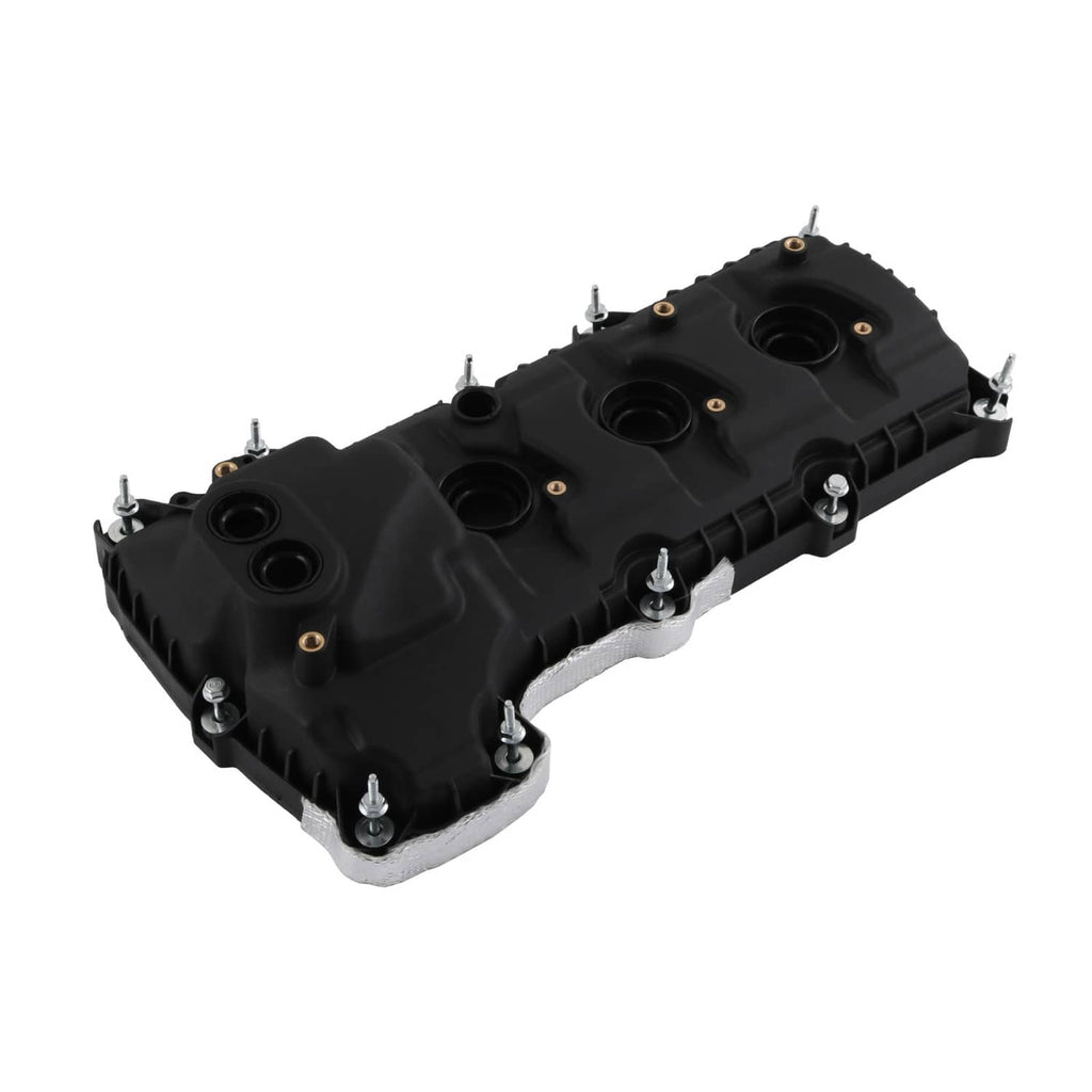 Black engine valve cover with ports and mounting bolts, angled view