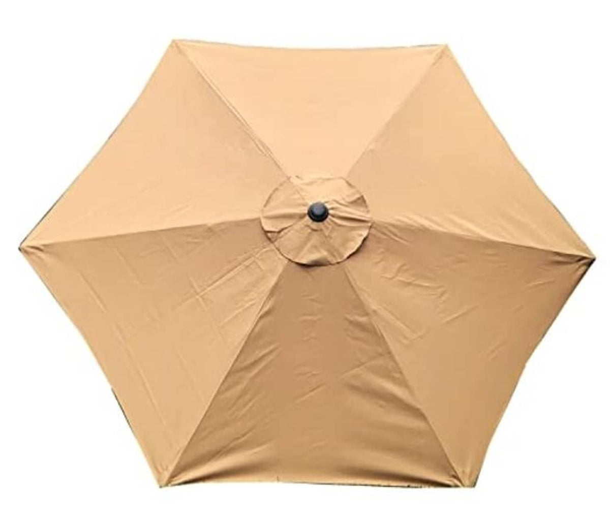 Tan patio umbrella canopy top view with central button and folded panels, canopy only.