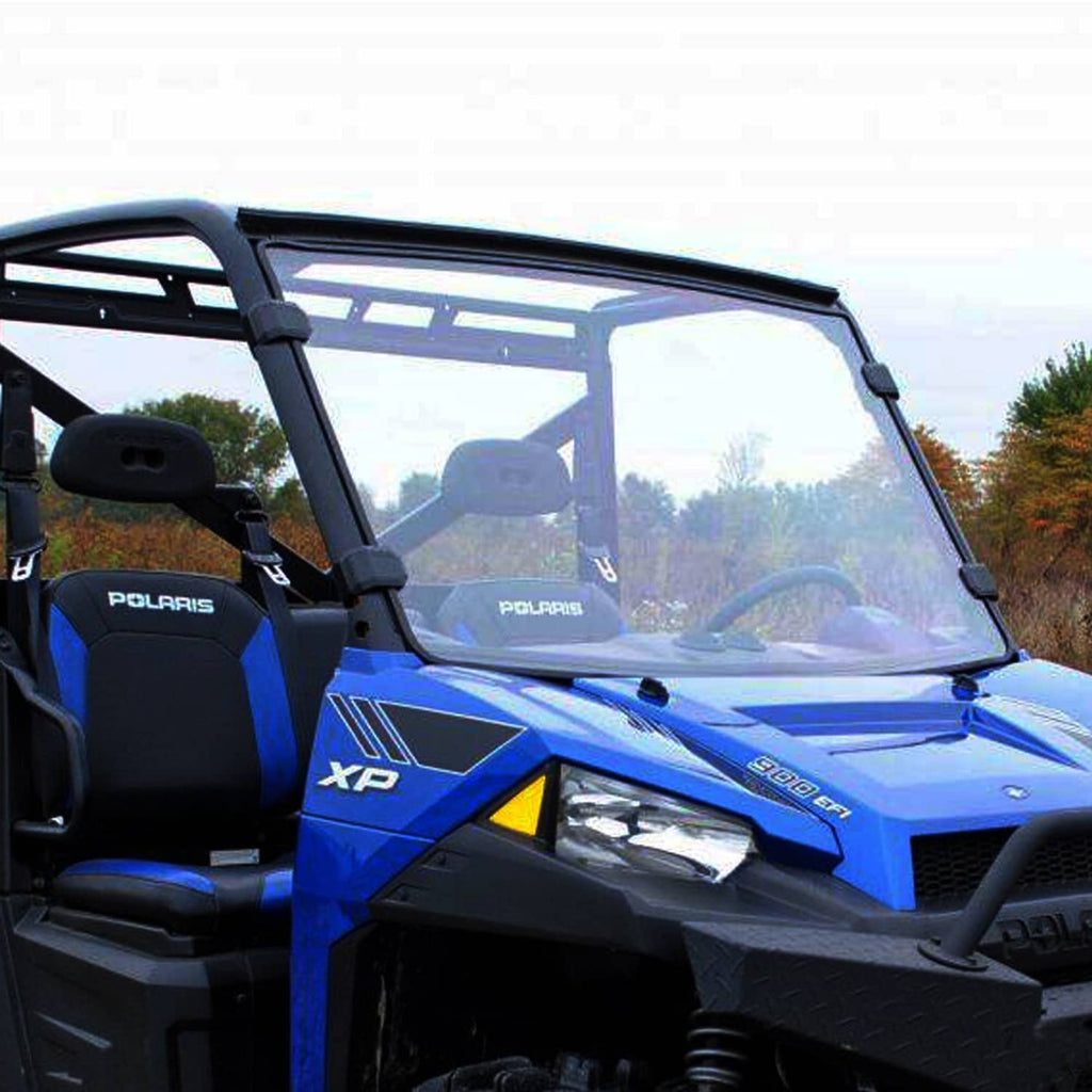 UTV full windshield with clear tinted panel and black frame on blue UTV, driver-side view