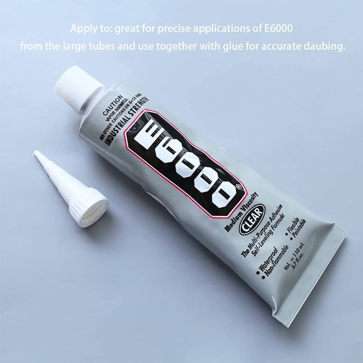 E6000 glue tube with white snip-tip cap and spare cap