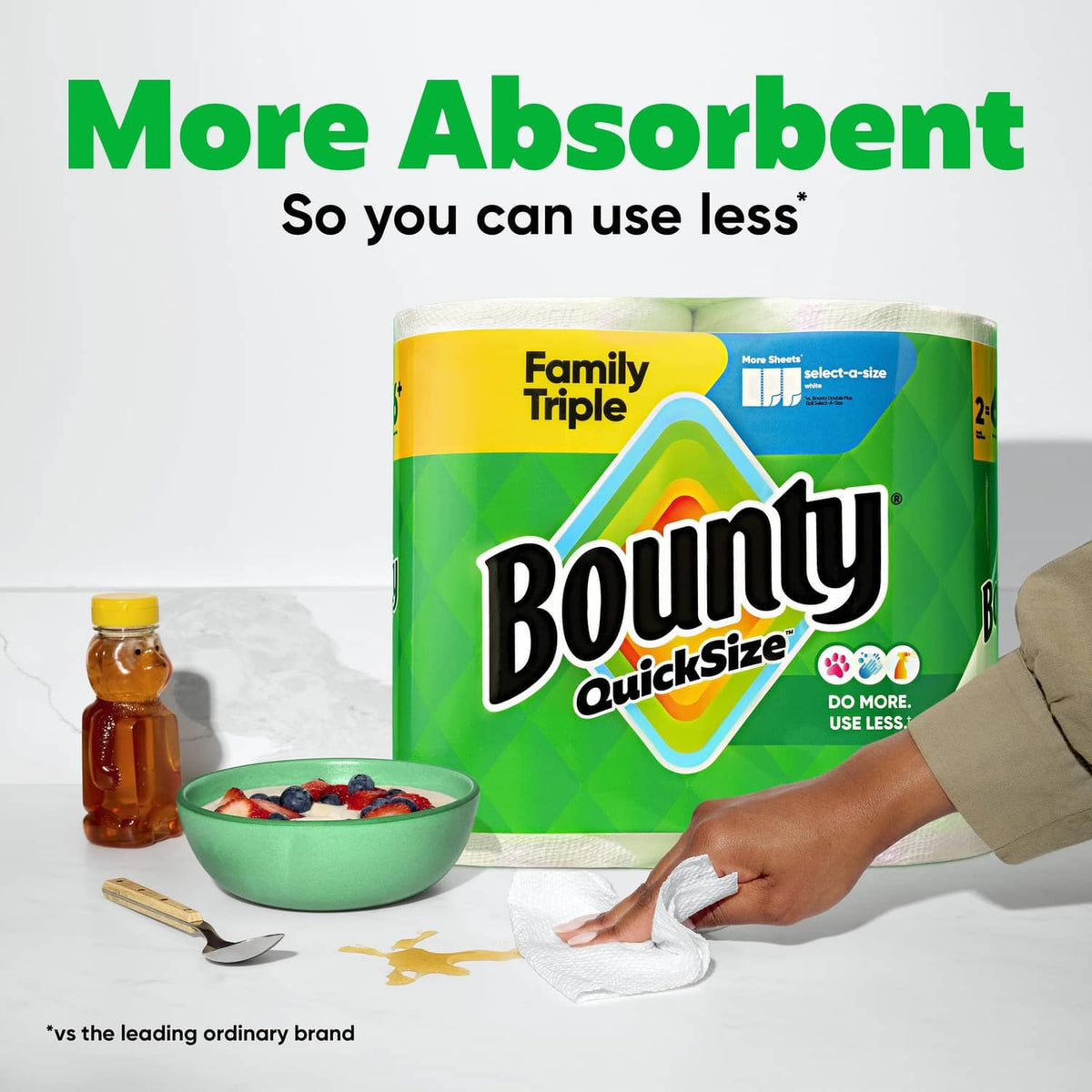 Bounty QuickSize Family Triple white paper towel roll pack, hand using sheet