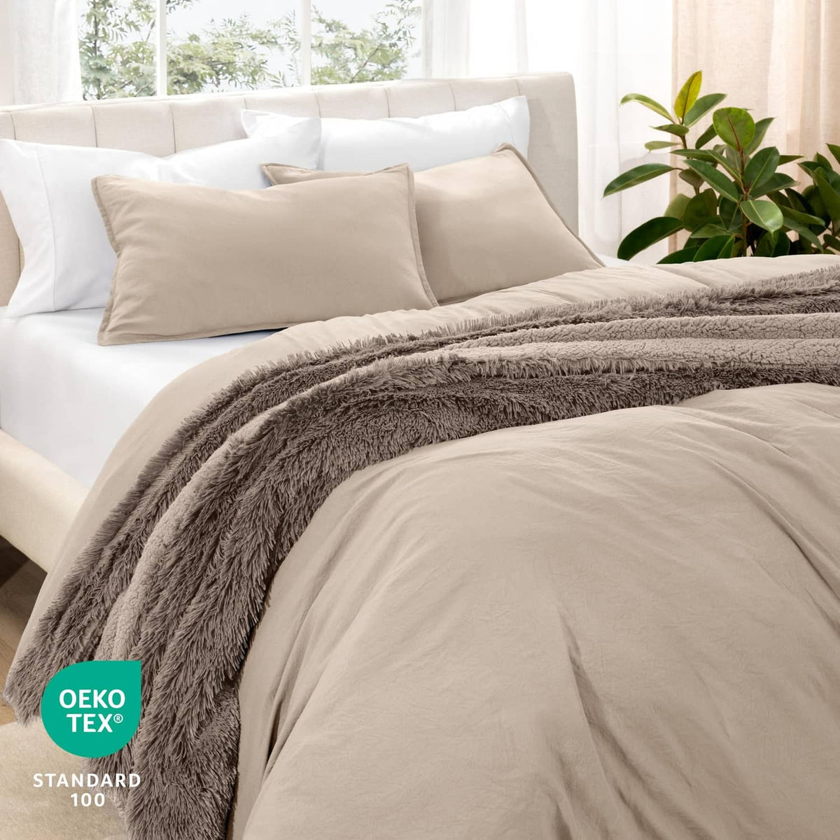 Queen duvet cover set, pebble beige with pillow shams, on a neatly made bed