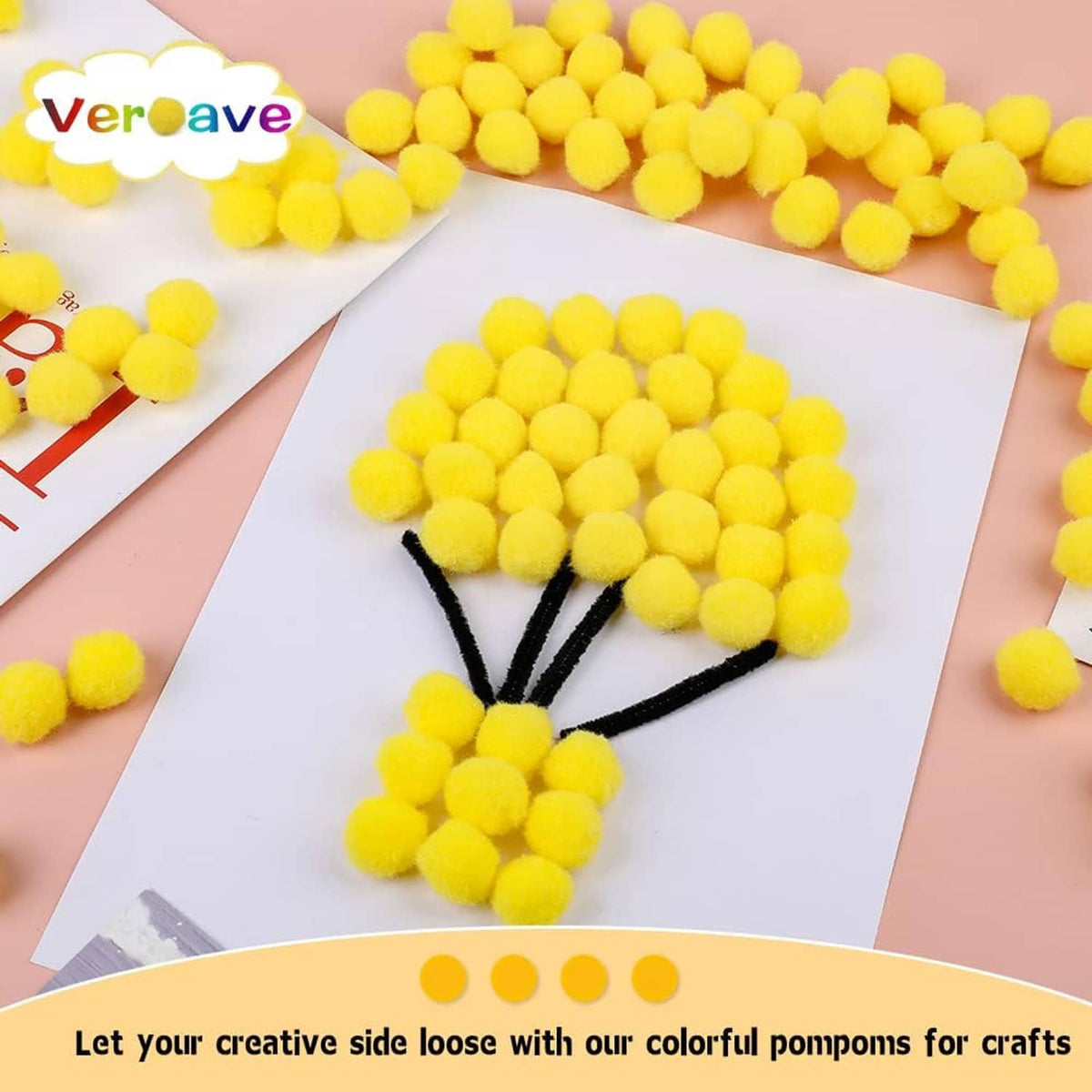 Yellow pom pom butterfly craft with black antenna on a white paper card