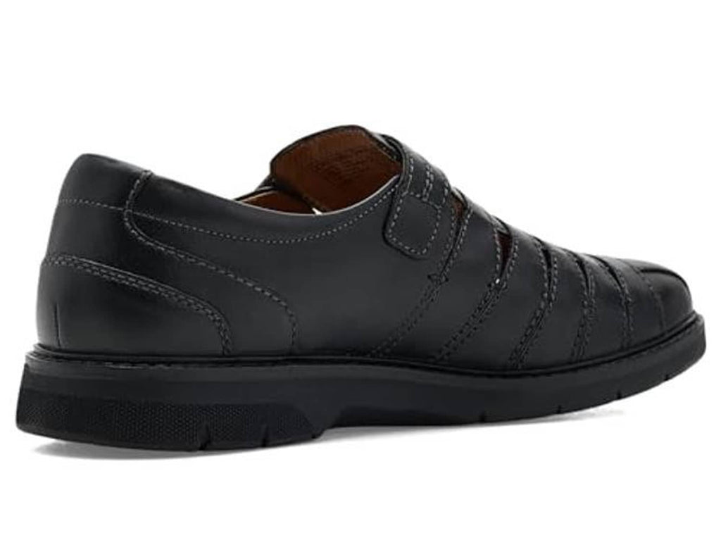 Black leather casual shoe rear view with side strap and stitched upper