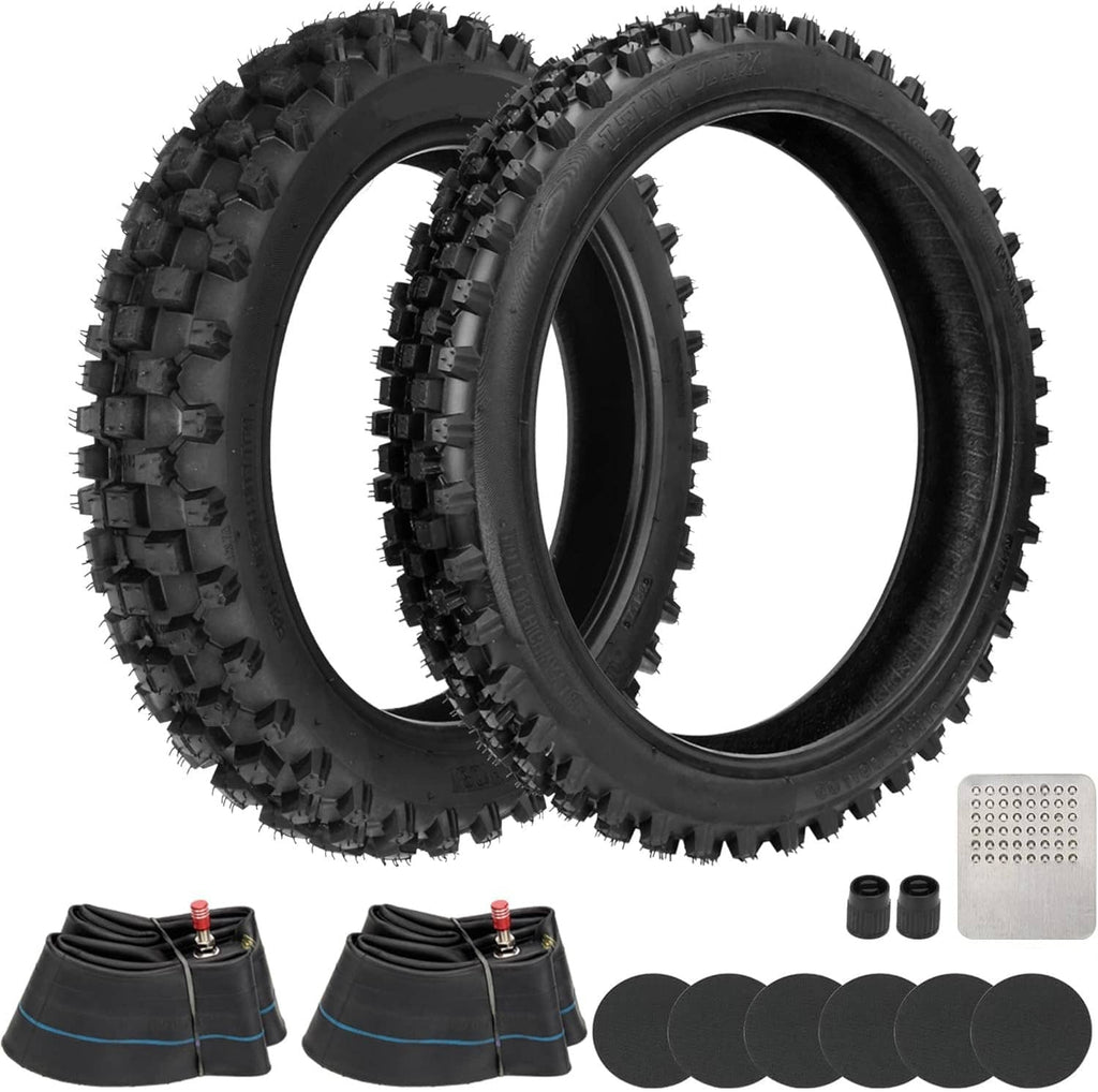 Two black knobby tires with inner tube and round repair patches, set