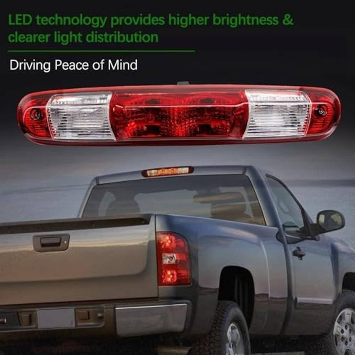 Red rear center high mount brake light installed on pickup truck rear panel