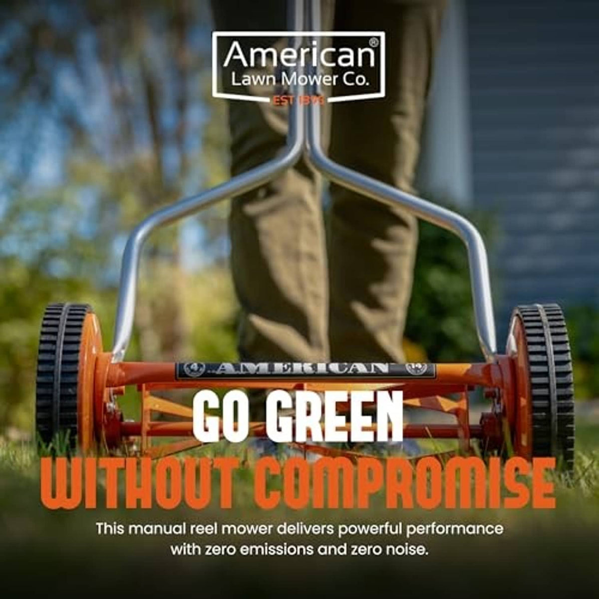 American reel lawn mower with orange deck, silver handle, and two front wheels