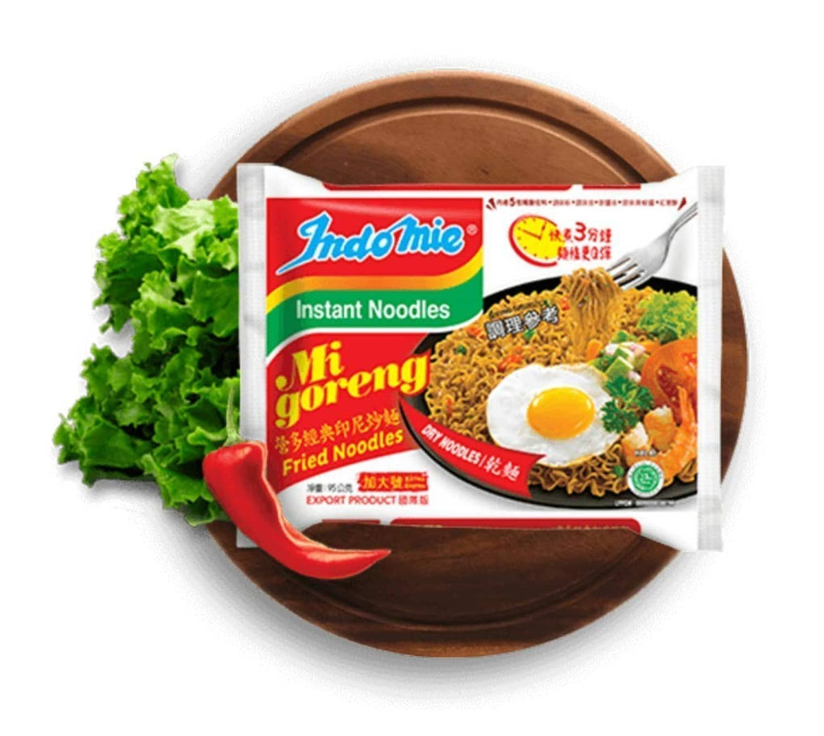 Indomie Mi Goreng noodle pack on plate with fried egg and vegetables