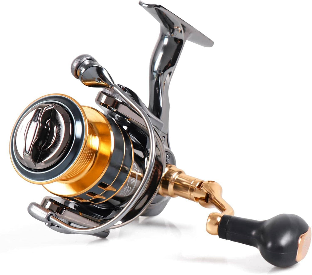 Spinning fishing reel close-up from side with gold spool, chrome frame, black handle