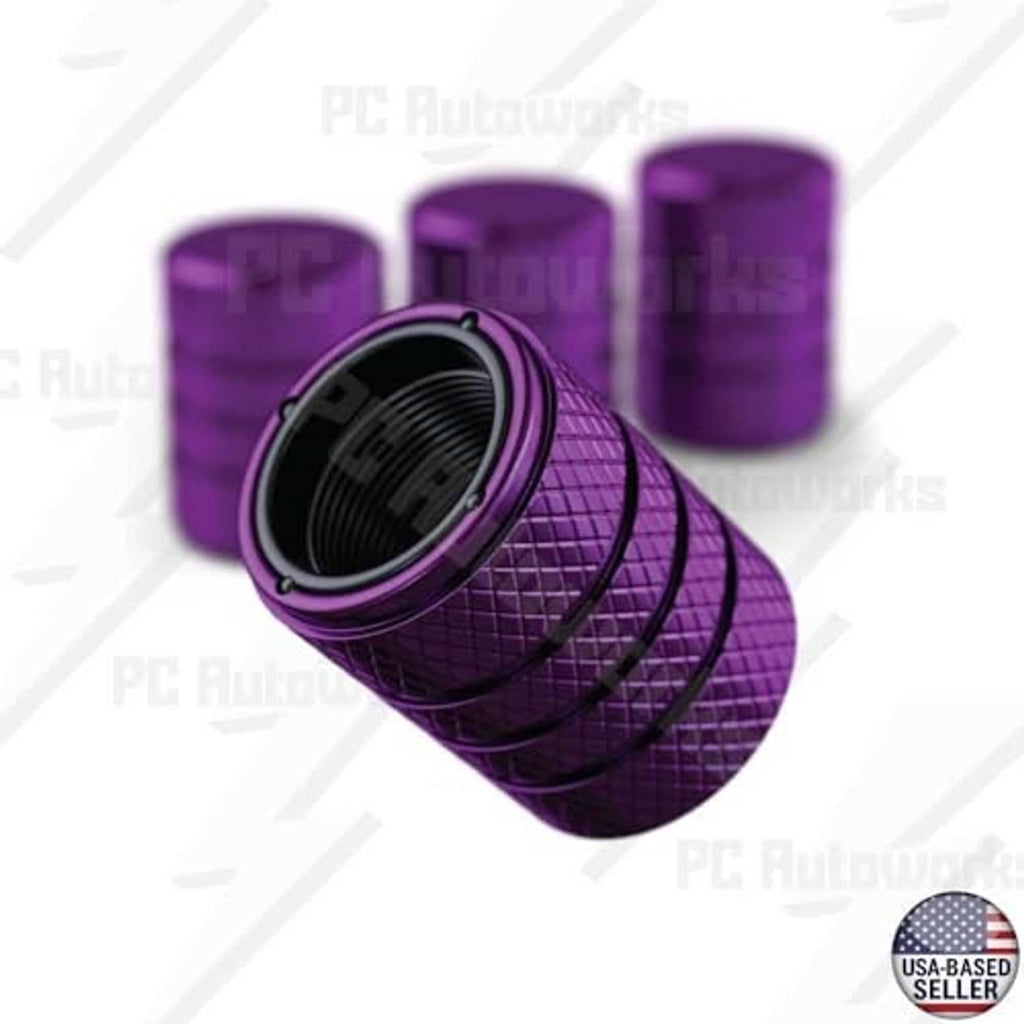 Plum purple tire valve stem cap set with textured anodized finish and open valve opening