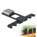 Black pool stick holder with four claw grips and silver weighted base