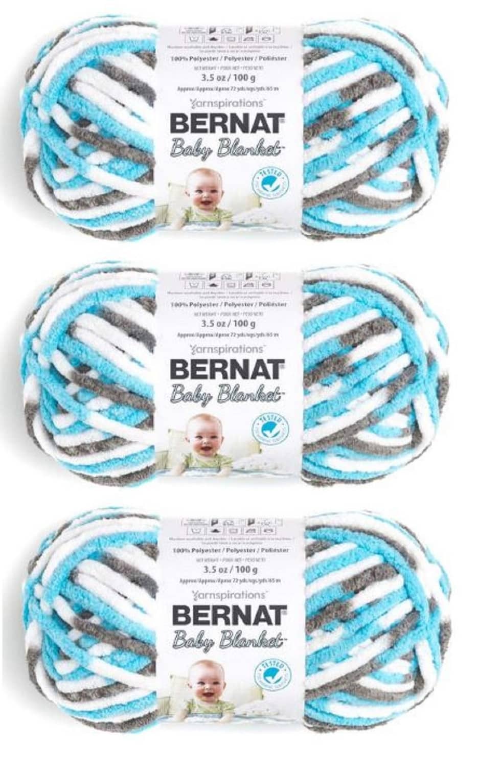 Bernat baby blanket yarn skeins, light blue white gray striped super bulky