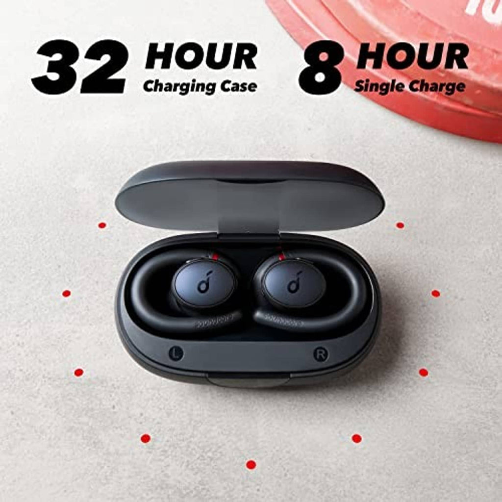 Black true wireless earbuds seated in open charging case, charging contacts visible.