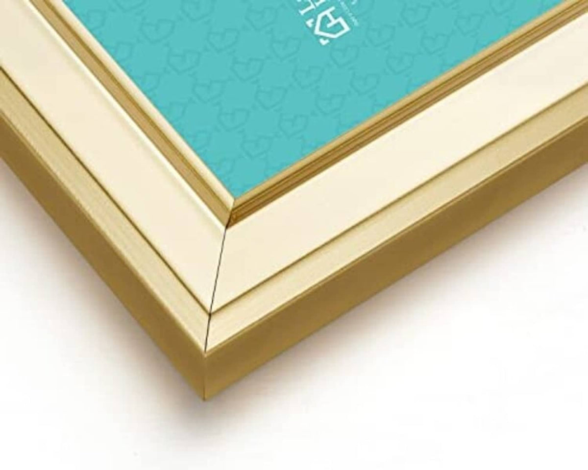 Beveled gold picture frame corner with teal mat