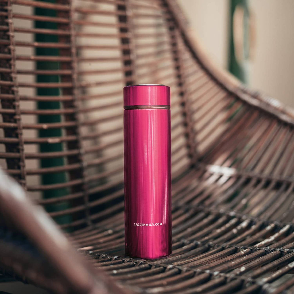 Red insulated insulin cooler case upright on a hammock seat