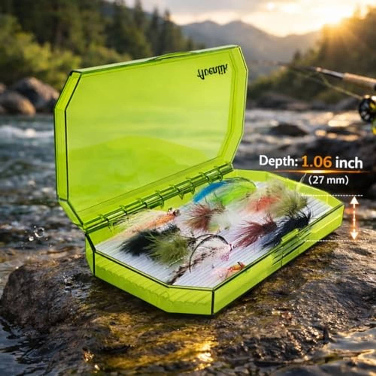 Green fly fishing box with clear lid open, holding assorted fly lures inside