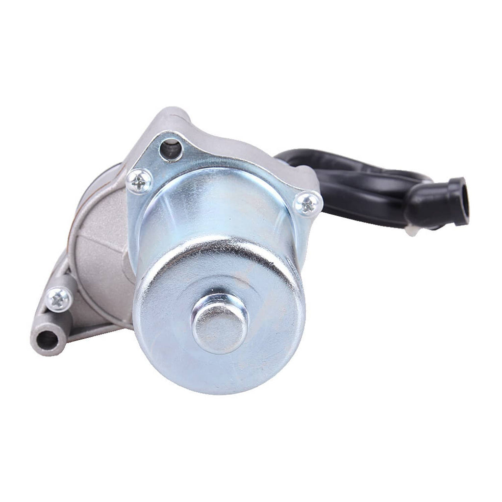 Starter motor with silver housing, mounting flange, and black electrical lead