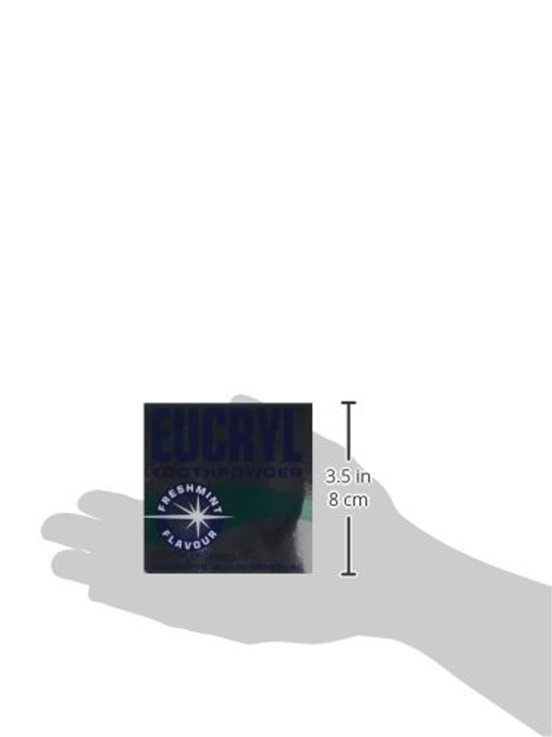 Eucryl Freshmint toothpowder tin held in hand, size shown
