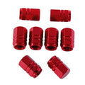 Set of 8 red metal tire valve stem caps with ridged sides and threaded openings