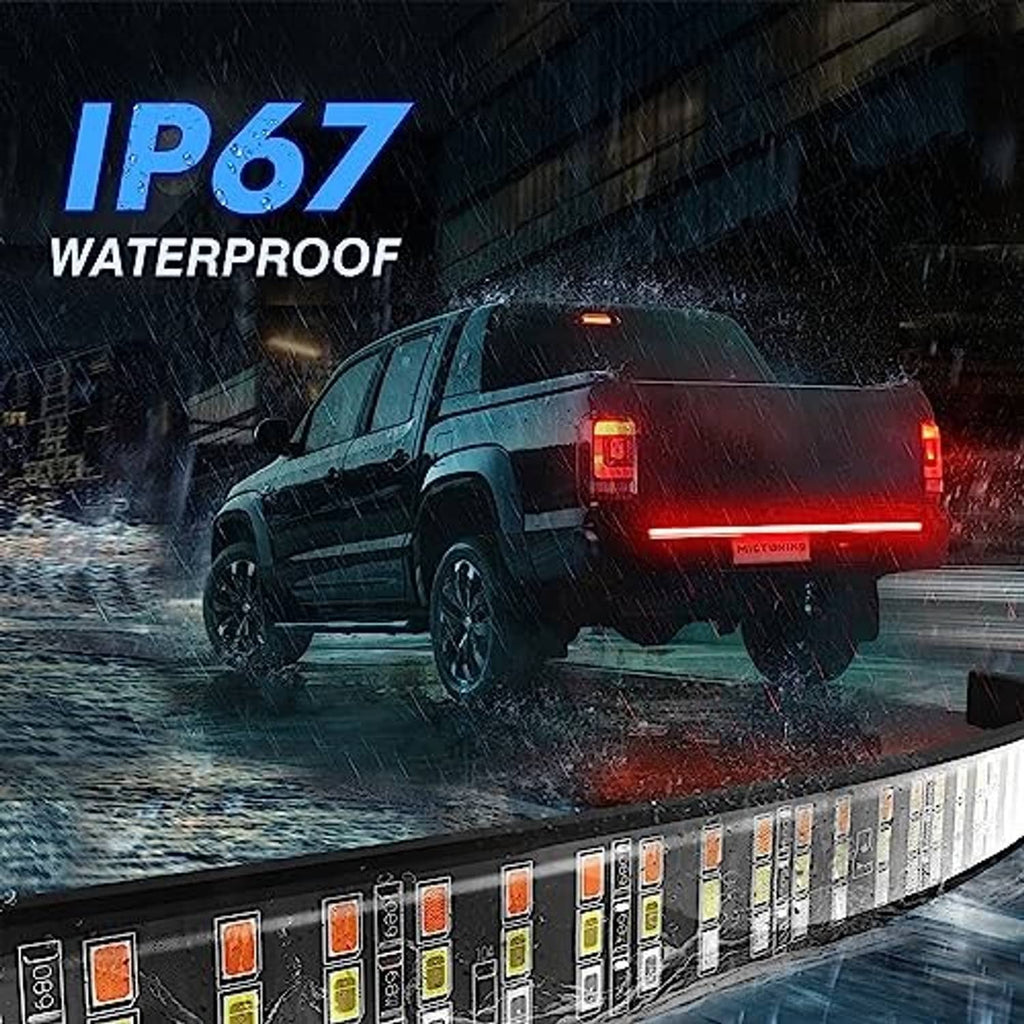 Waterproof IP67 tailgate LED light bar on pickup, glowing red