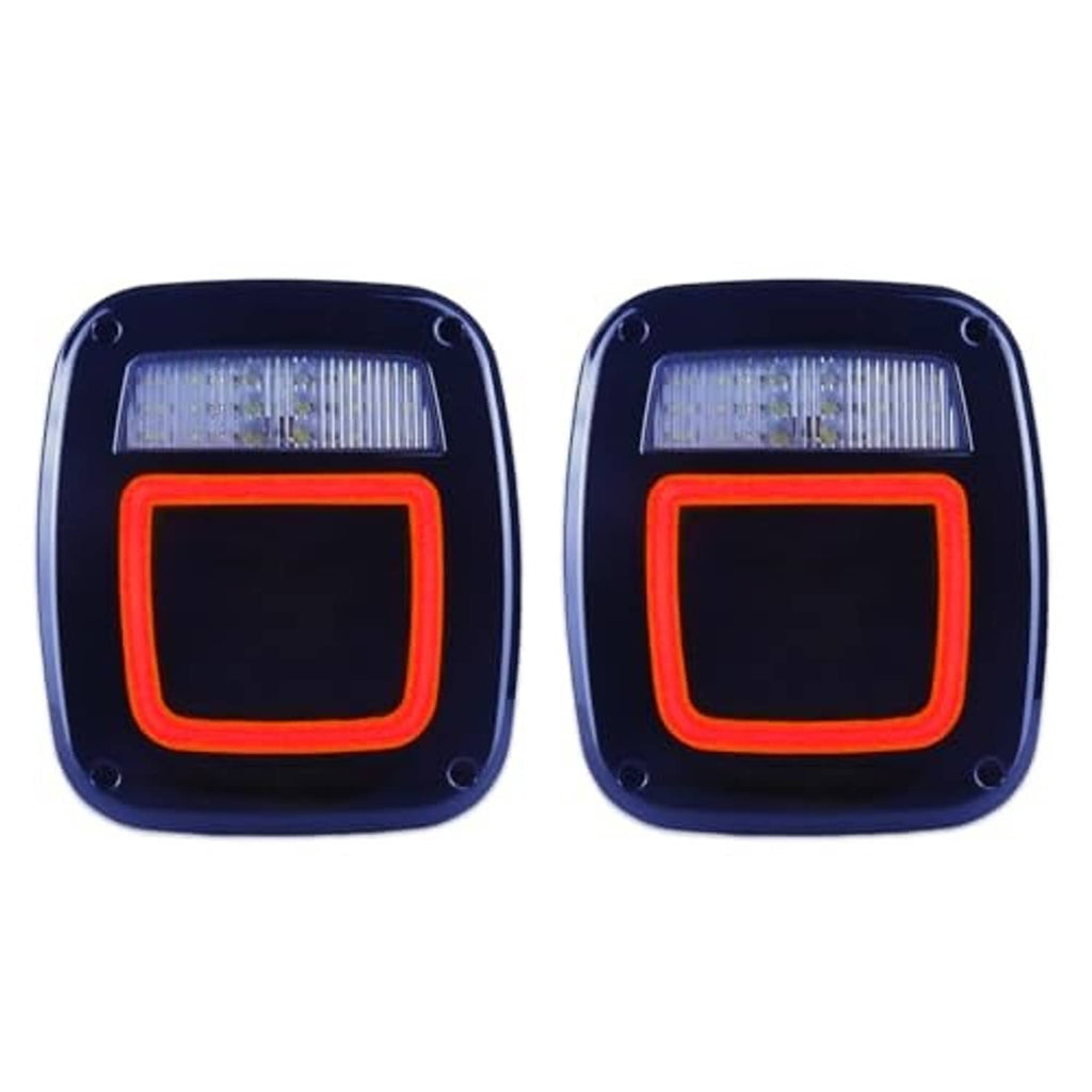 Two square smoked rear tail lights with white lens bar and red illuminated halo