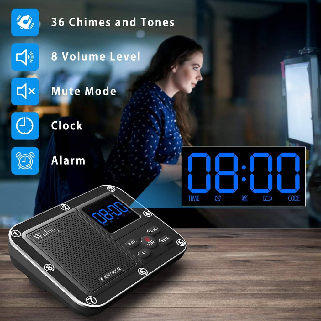 Wireless driveway alarm receiver with blue digital time display on tabletop