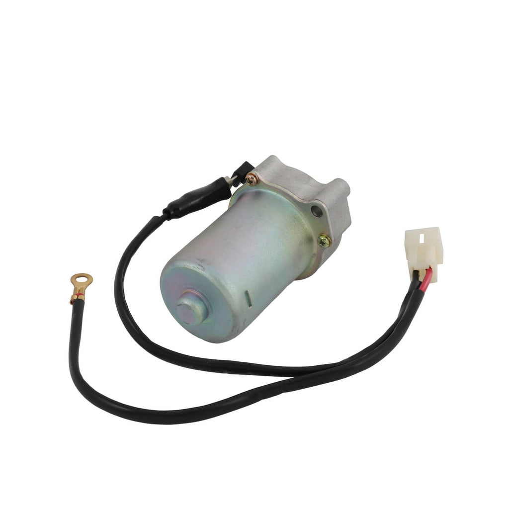 Starter motor with solenoid body and black wiring, showing white electrical plug