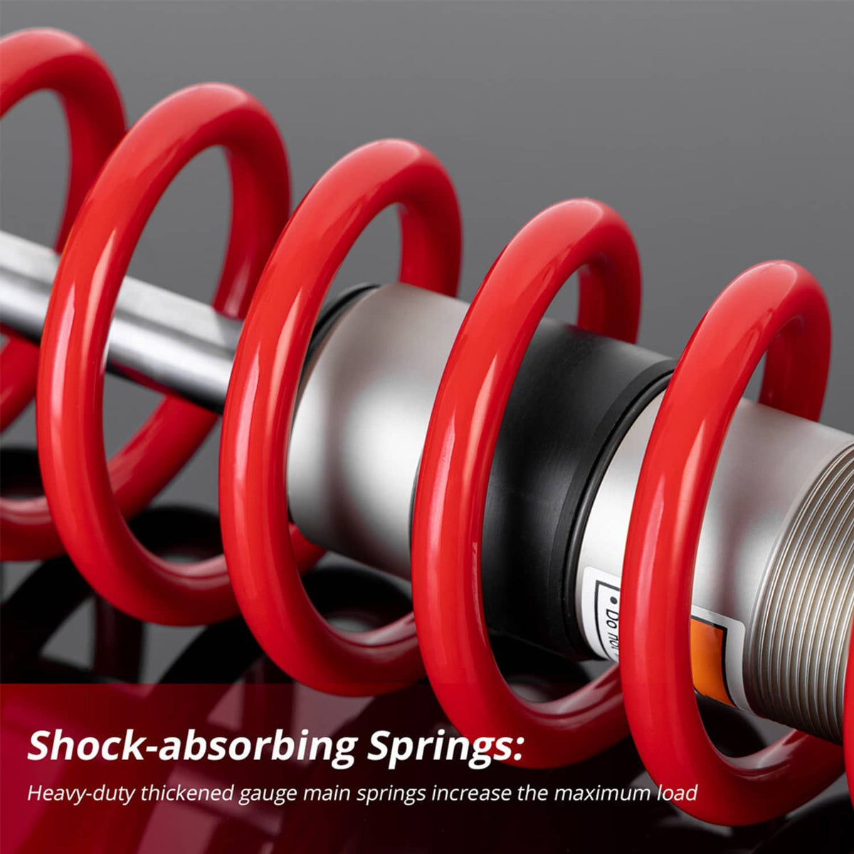 Red coil air shock absorbers with silver cylinders and black brackets