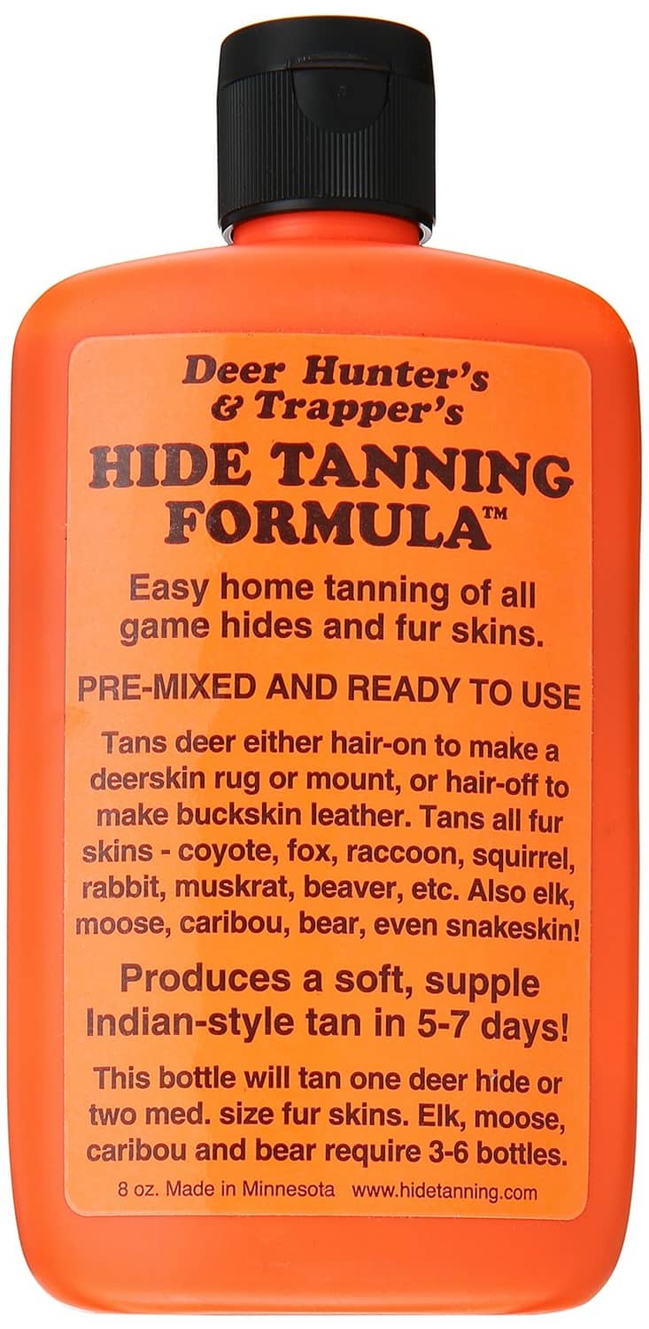 Hide tanning formula bottle with orange label, black cap; pre-mixed for game hides