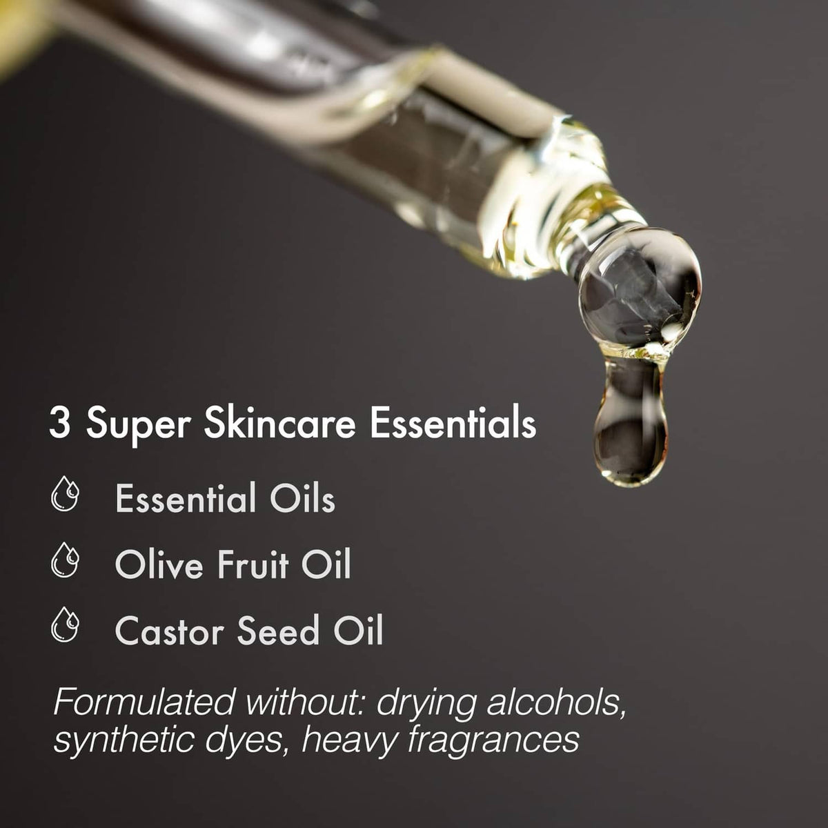 Clear oil drop from a bottle spout for pre-shave essentials, The Art of Shaving.