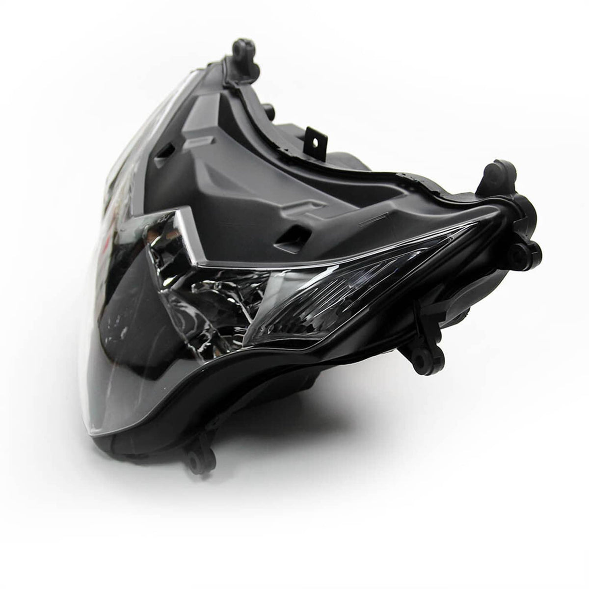 Side view of front headlight housing assembly with clear lens and black bracket mounts