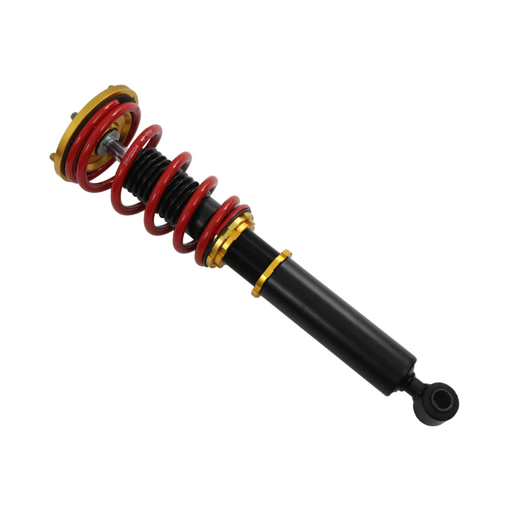 Coilover shock assembly with red and black springs and gold mounting rings