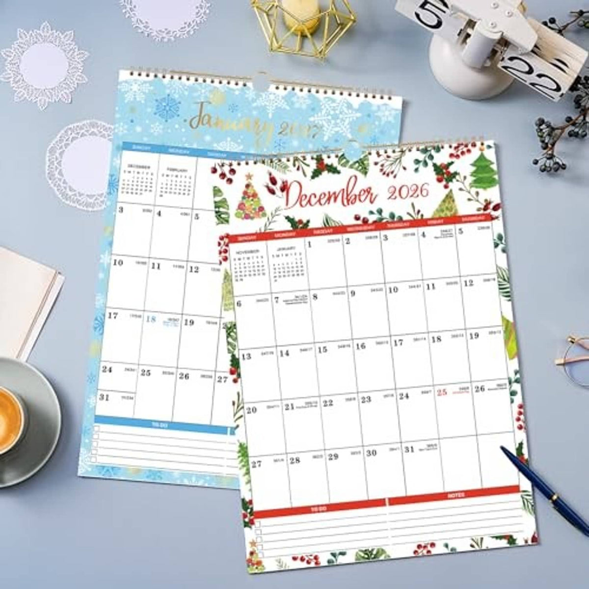 Two 2026 wall calendars with January and December pages, each with date grids and notes