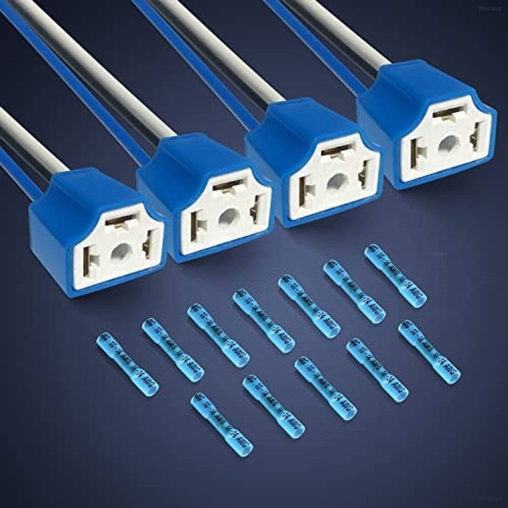 Row of blue headlight wiring harness plugs with white ceramic sockets and attached wire leads