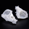 White inner fairing speaker cover housings with circular openings and mounting holes