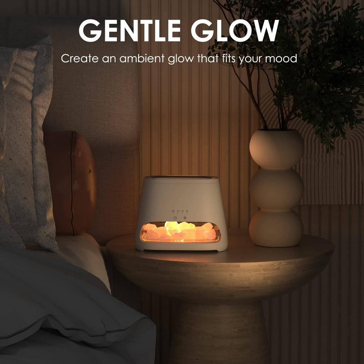 White salt lamp diffuser glowing on a bedside surface