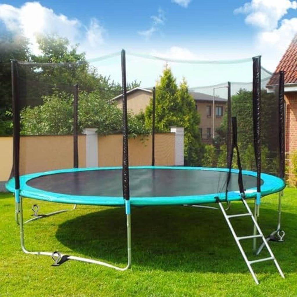 Trampoline base secured with black screw ground anchor stakes around the perimeter