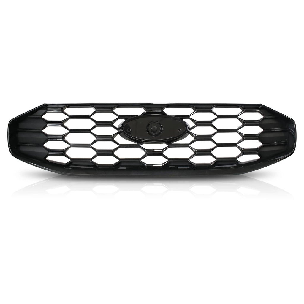Black grille insert with hex honeycomb pattern and central emblem opening